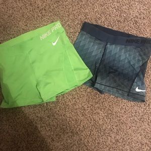 Two Nike Pro shorts